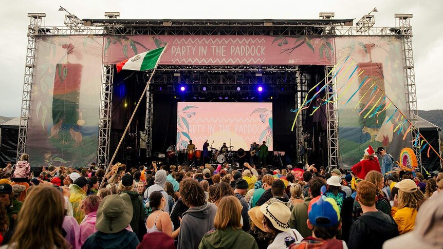 Festival goers celebrating in front of the stage at the 2019 Party in the Paddock Festival