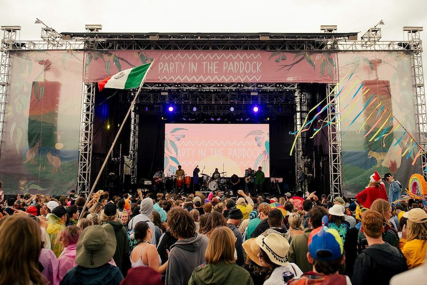 Festival goers celebrating in front of the stage at the 2019 Party in the Paddock Festival