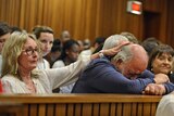 Barry Steenkamp, the father of Reeva Steenkamp, cries during the sentencing proceedings