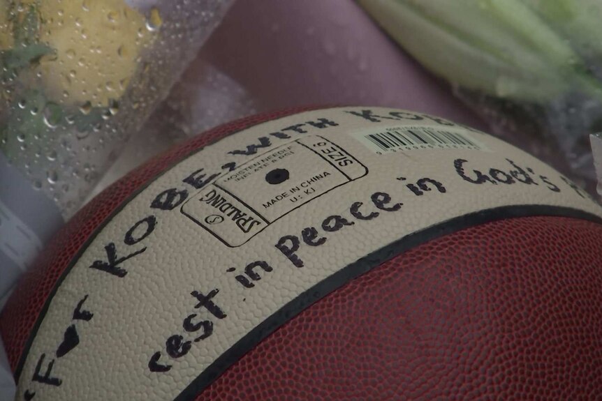 a basketball which reads for kobe rest in peace