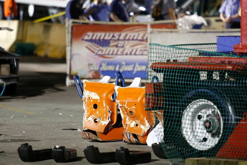 The back of orange carriage that fell of Fire Ball ride at Ohio State Fair.