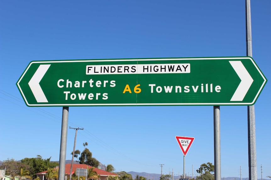 A road sign reading Flinders Highway.