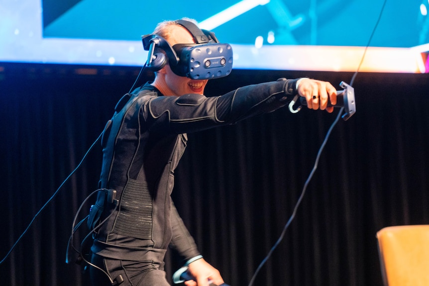 Haptic feedback' virtual reality Teslasuit can simulate everything from a to hug - ABC