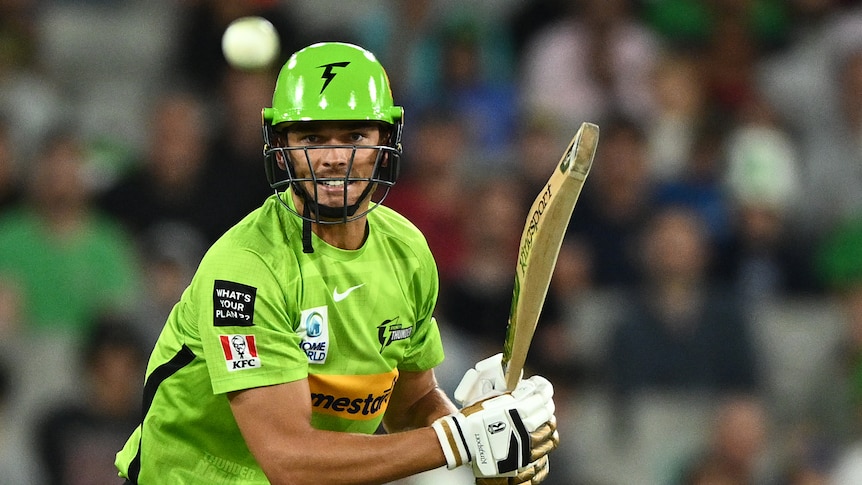 A white ball in front of Chris Green of the Sydney Thunder.