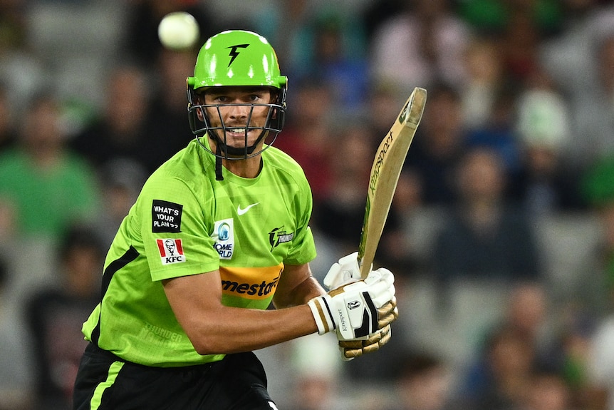 A white ball in front of Chris Green of the Sydney Thunder.