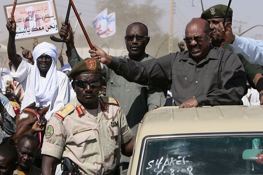 Sudan's President Omar Hassan al-Bashir (R)