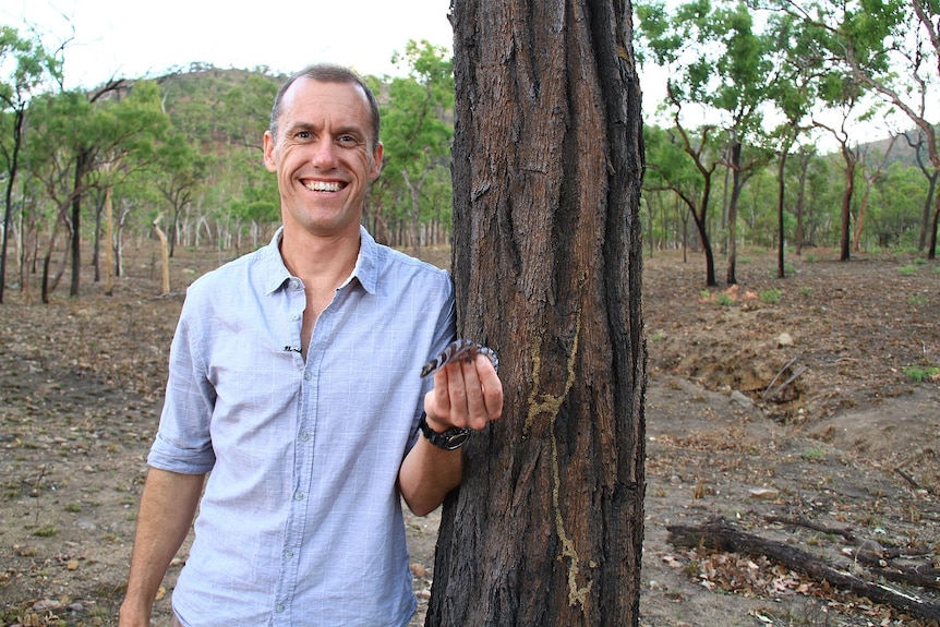 Dr Conrad Hoskin holding a native gecko species