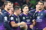 Billy Slater (C) after scoring a try for the Storm against the Knights on Friday night.