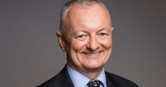 Antony Green smiles.