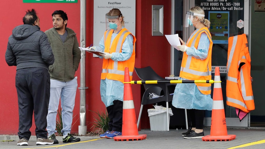 Patients are screened before entering a medical centre in central Christchurch, New Zealand.