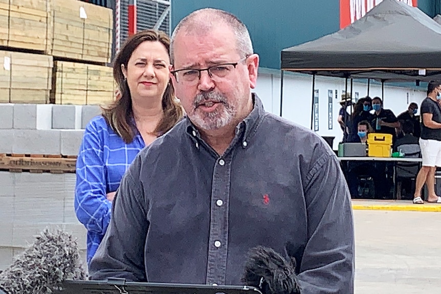 Dr Peter Aitken speaks at a press conference in Brisbane