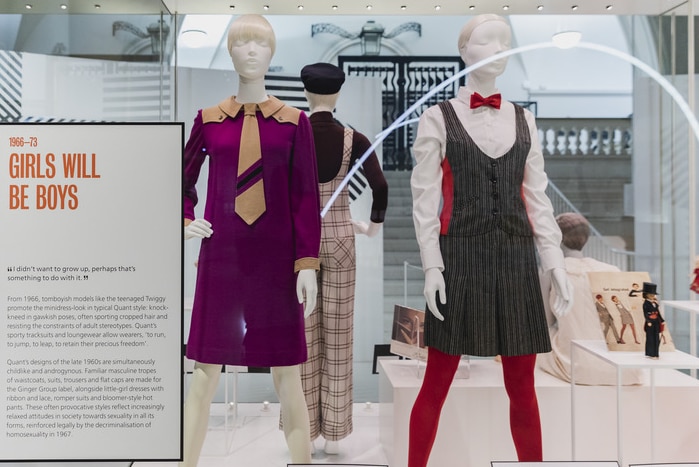 a mid shot of a number of dresses from the 1960s designed by Mary Quant and on display