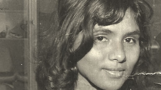 A black and white head shot of Rhonda Collard-Spratt at 16.