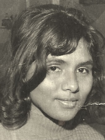 A black and white head shot of Rhonda Collard-Spratt at 16.