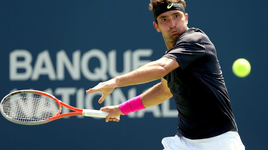 Matosevic in action against Nadal at the Rogers Cup