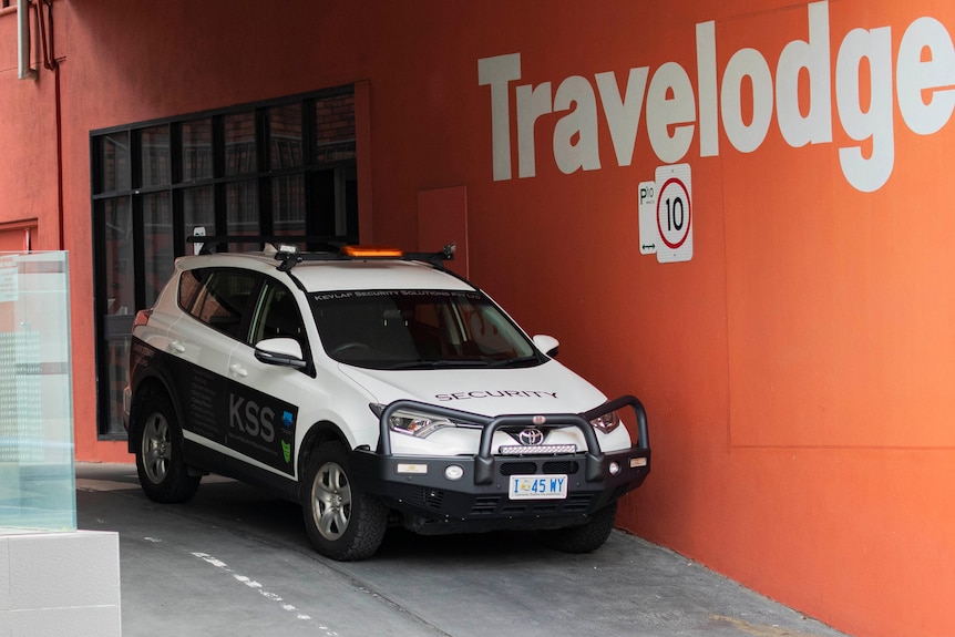 A security car outside the Travelodge Hotel.