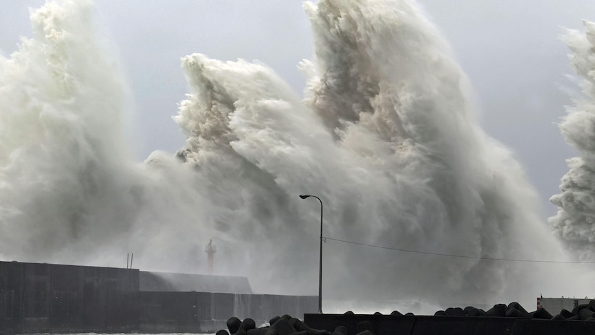 High waves triggered by Typhoon Nanmadol are seen at a fishing port in Aki, Kochi Prefecture, western Japan.