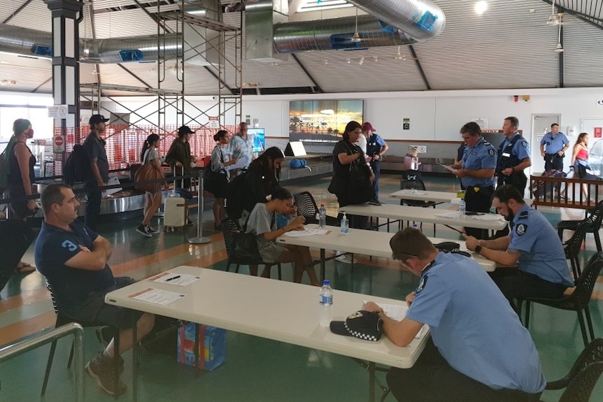 People queuing up at regional airport