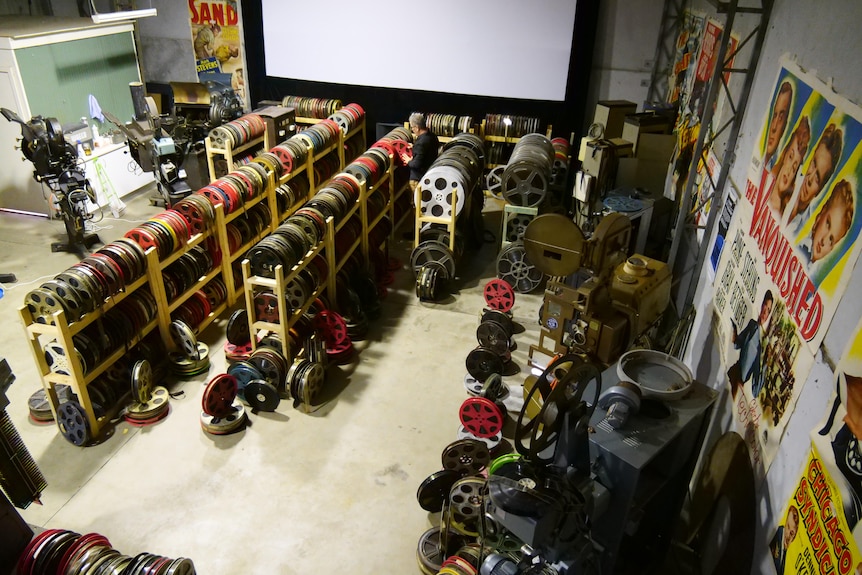 Looking down on a room full of old cinema equipment