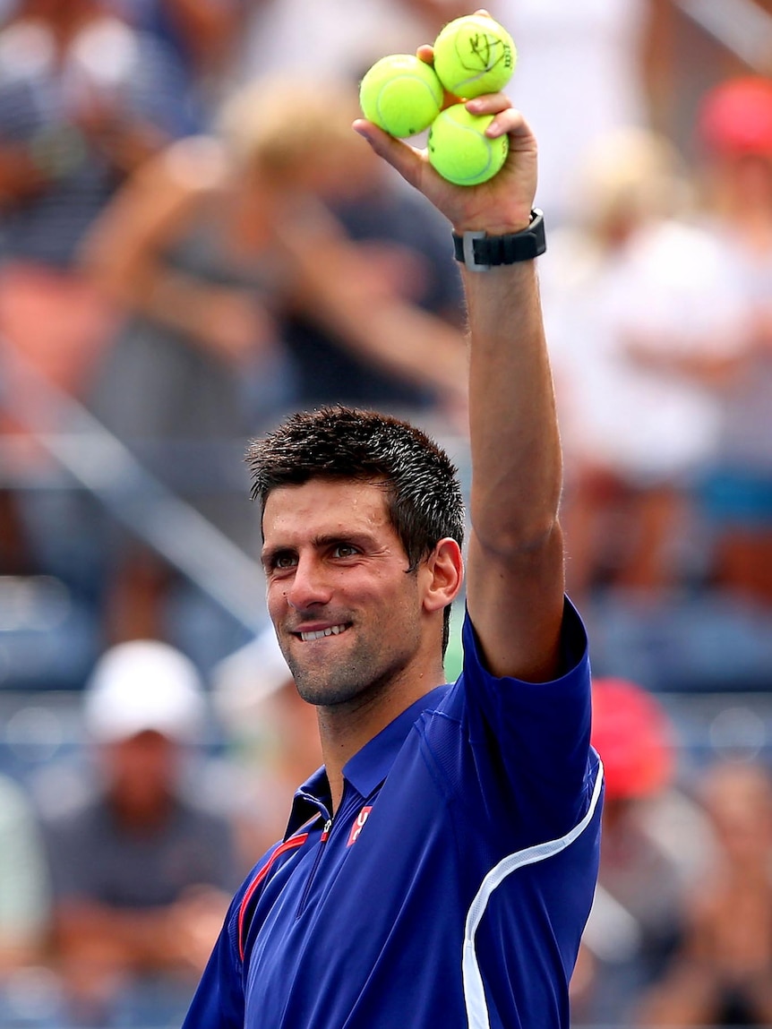 Novak Djokovic acknowledges the crowd after winning his third round match at the US Open.
