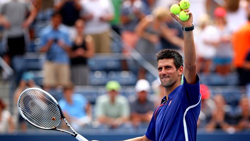 Novak Djokovic acknowledges the crowd after winning his third round match at the US Open.