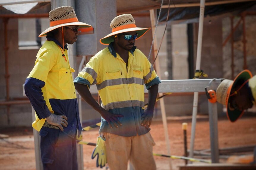 Men working at a new timber mill in north-east Arnhem Land