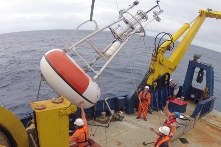 ship loading a marine buoy