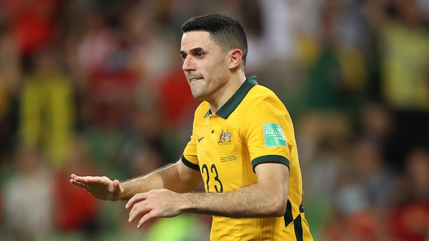 Tom Rogic celebrates scoring a goal for the Socceroos during World Cup qualifying