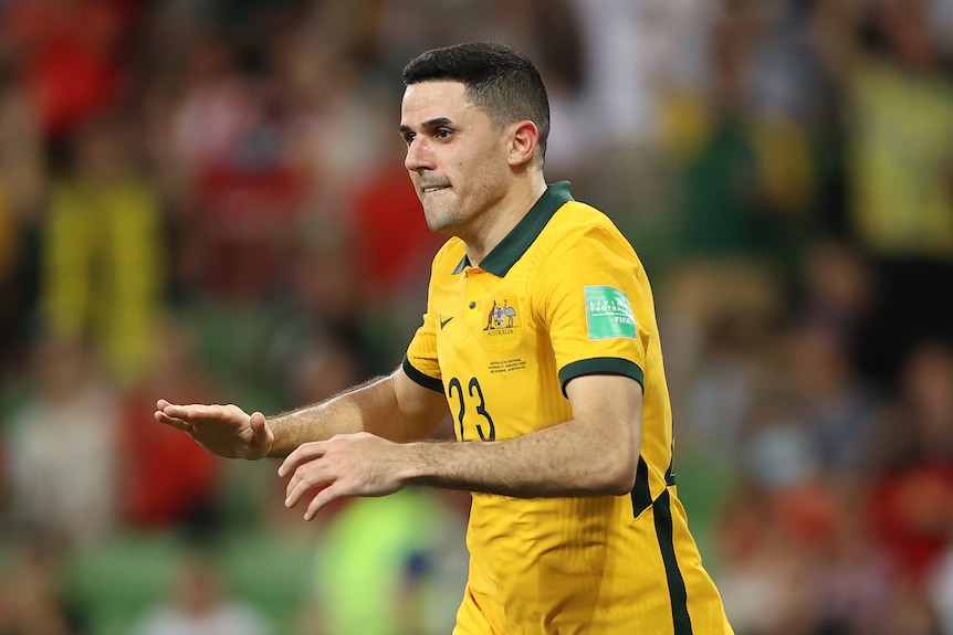 Tom Rogic celebrates scoring a goal for the Socceroos during World Cup qualifying