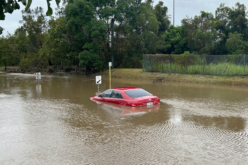 A flooded side road near the M1 at Helensvale