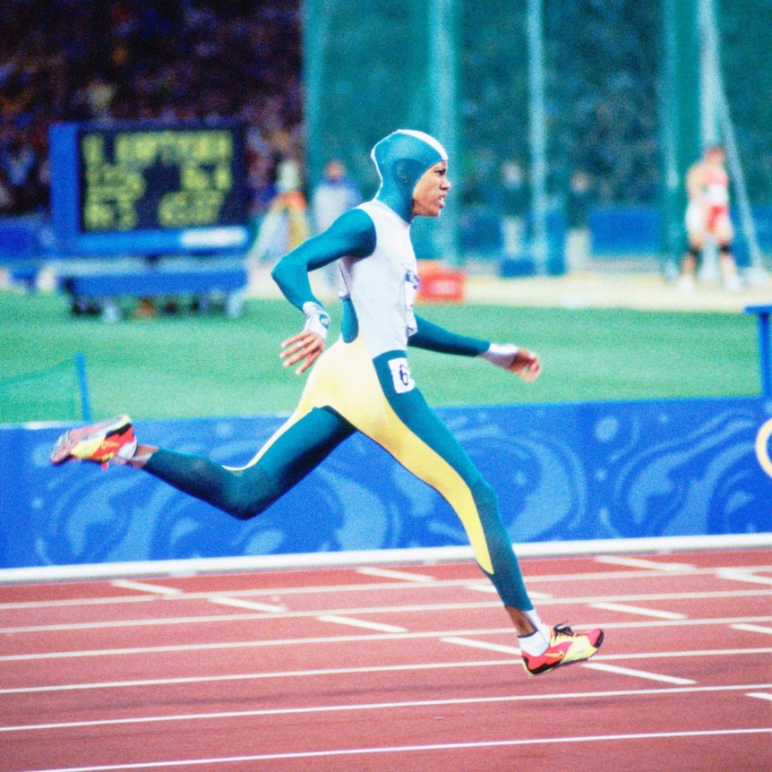 Cathy Freeman races to victory in the women's 400m final at the Sydney Olympics.