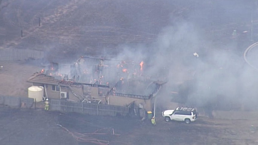 Aerial image of a bushfire-ravaged house at Laidley.