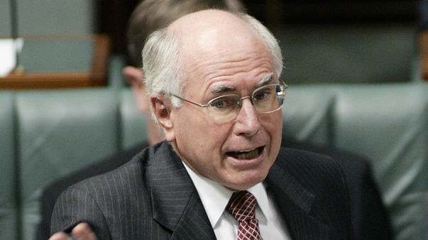 John Howard says serious questions have been raised about the political judgement of Kevin Rudd. (File photo)