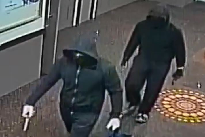 Two men armed with knives and wearing black clothing rob Canberra Deakin Football Club