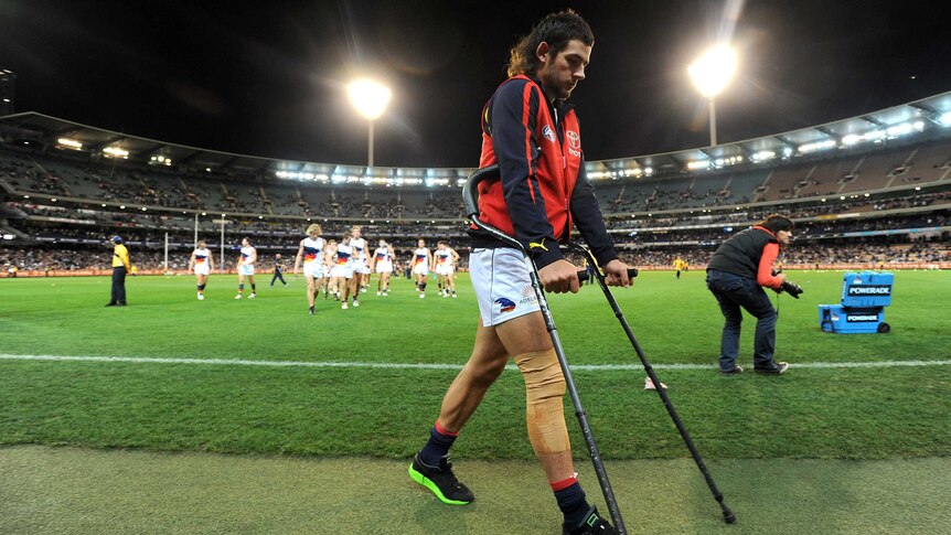 Walker limps off MCG