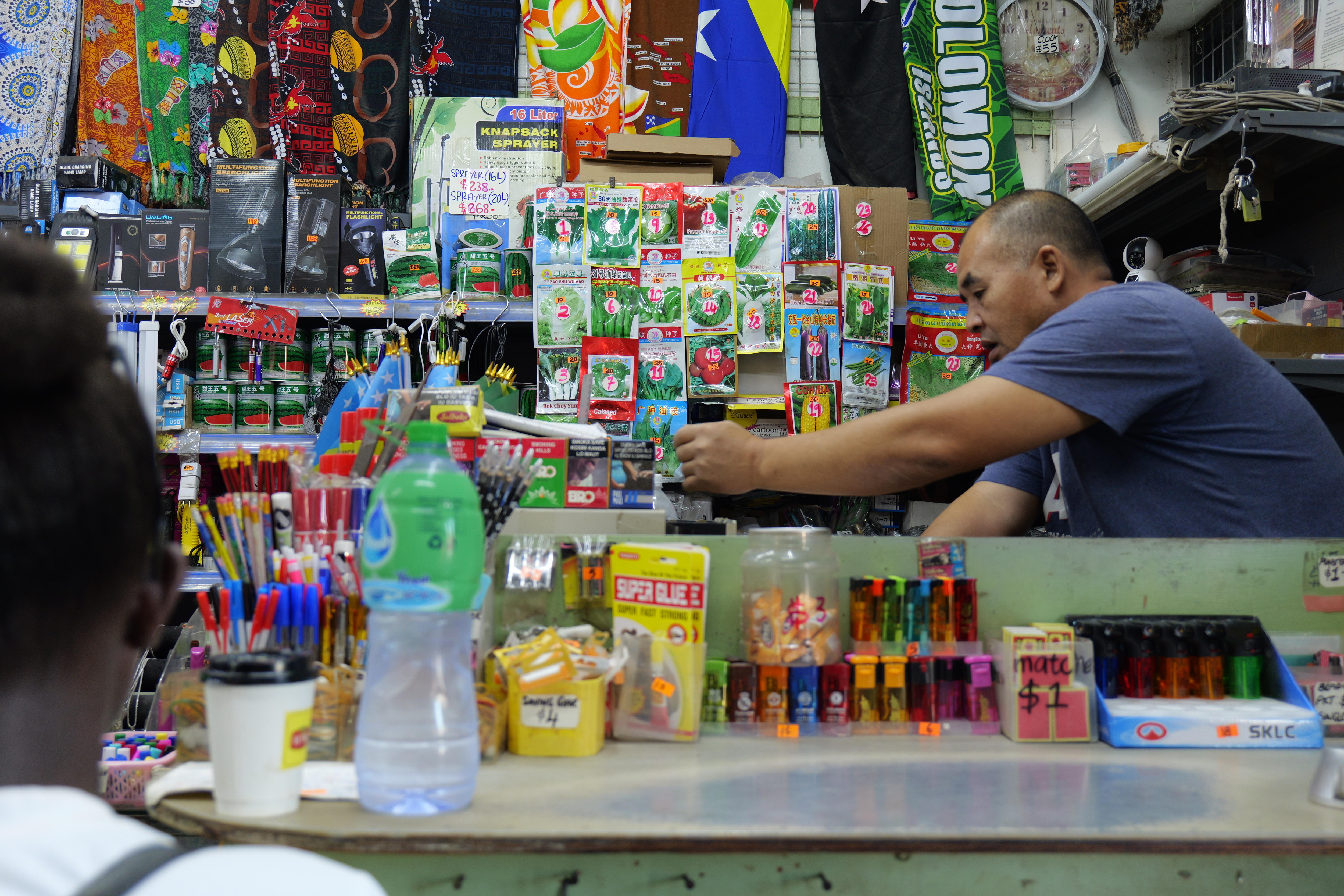A boss sits in the cashier counter