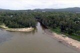 Muddy waters: A Tumbi Creek dredging grant email is at the centre of fraud allegations.