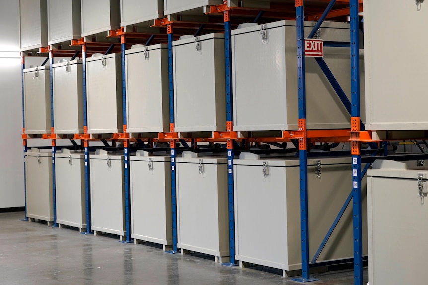 A rack of metal containers where human bodies are kept during the first month of a two-month composing  process 