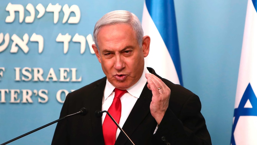 Prime Minister Benjamin Netanyahu delivers a speech from his Jerusalem office.