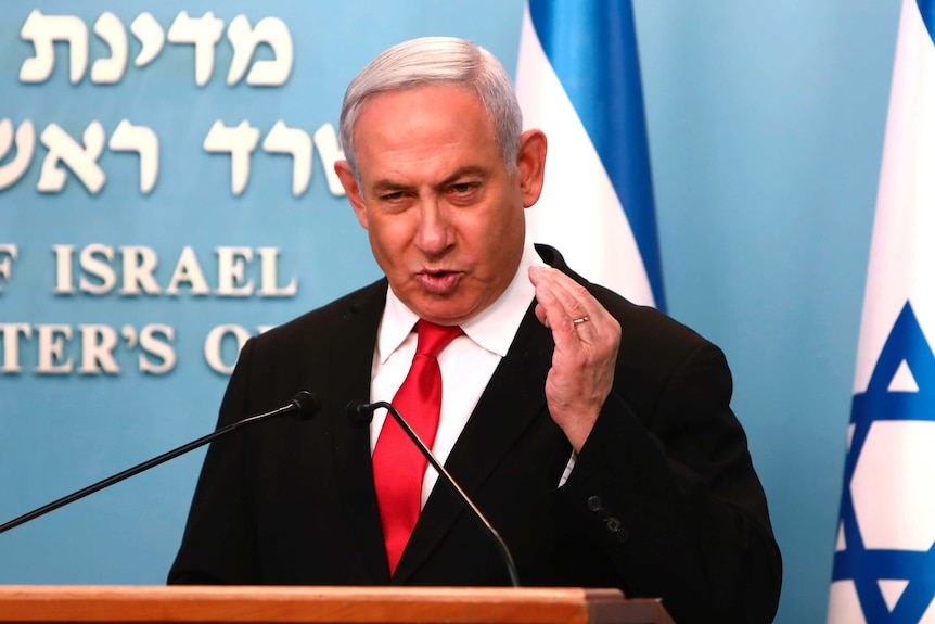 Prime Minister Benjamin Netanyahu delivers a speech from his Jerusalem office.