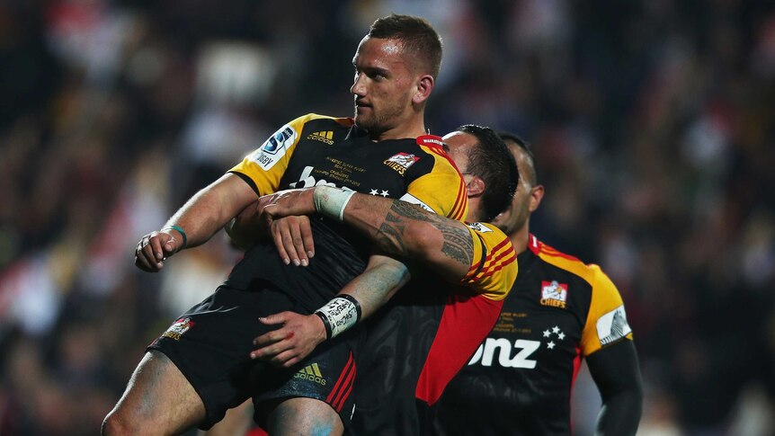 Thrilling win ... Aaron Cruden celebrates with Liam Messam after scoring a try for the Chiefs