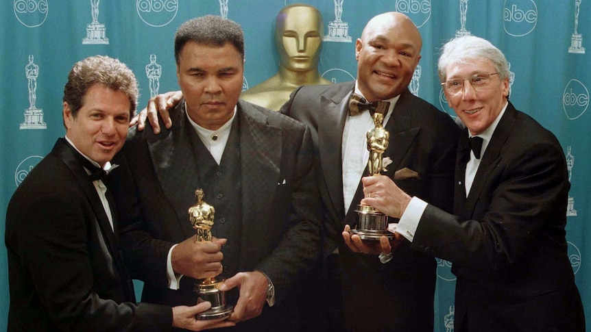 Muhammad Ali and George Foreman with Oscars