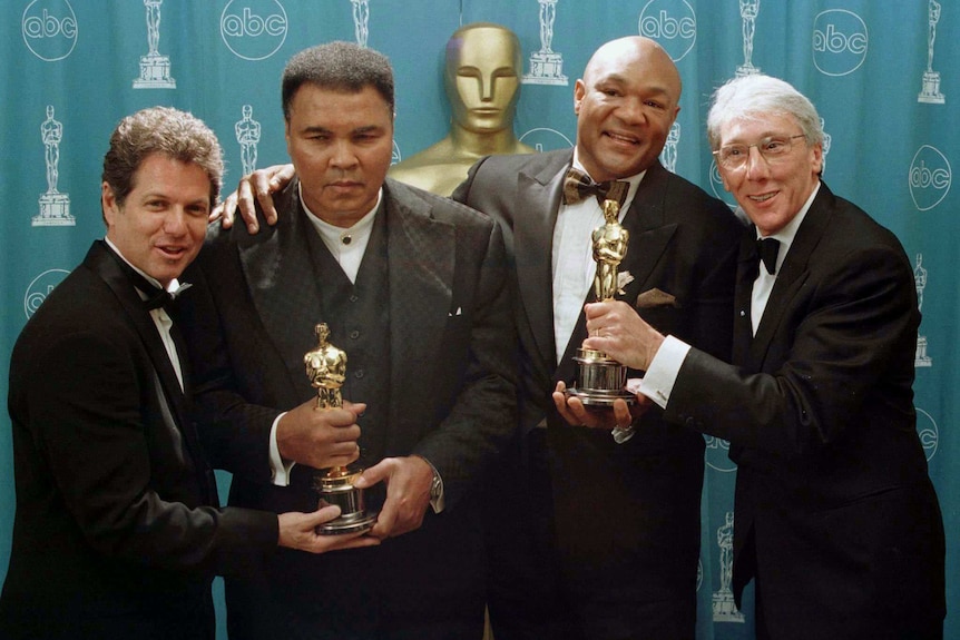 Muhammad Ali and George Foreman with Oscars