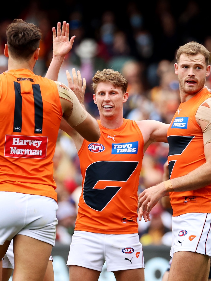 AFL live: Giants tussle with Hawks as Tigers celebrate win over Eagles
