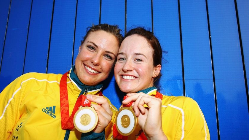 Tessa Parkinson and Elise Rechichi celebrate with their gold medals