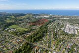 An aerial shot of Coffs Harbour highlighting a development proposal area. 