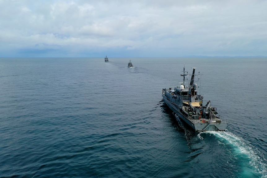 ADF ships on the open ocean on a cloudy day