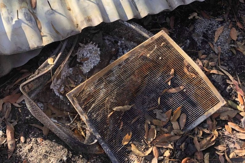 A beehive that was destroyed in the bushfires.