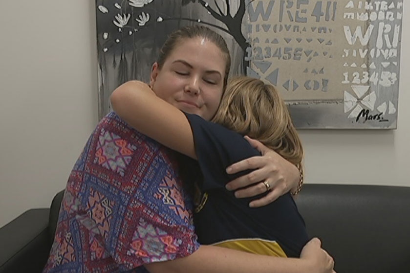 Kelly Mulligan hugs her eight-year-old daughter Ella