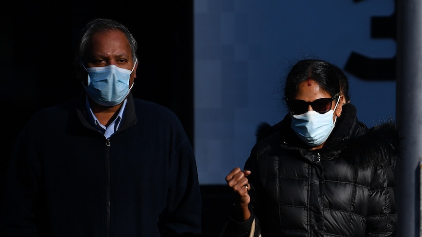 Khandasamy (left) and Kumuthini Kannan (right) arrive to the Supreme Court of Victoria.